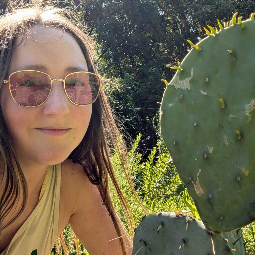 Devon with a prickly pear cactus